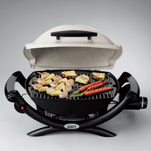 Weber Baby Q™ 1000 with food on grill